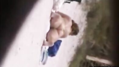 Peeking at Stepmom's big ass on the beach